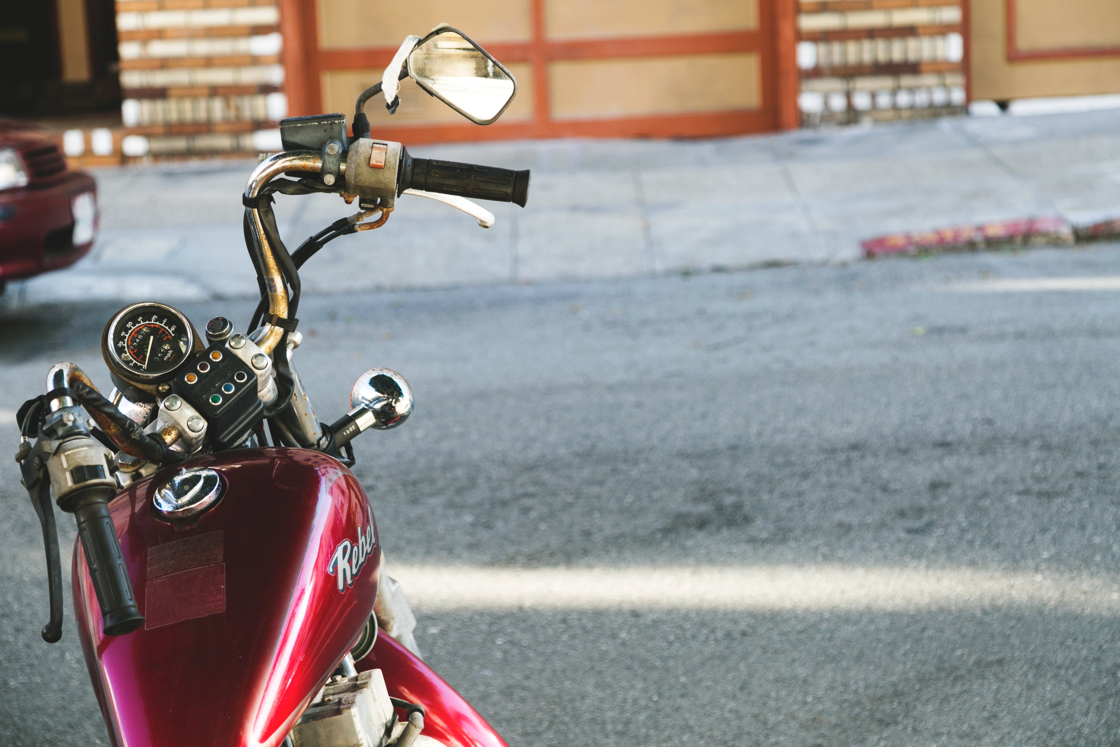 Red Motorcycle outside parked